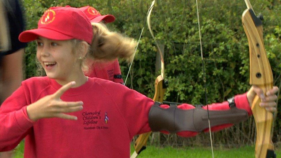 Children doing archery