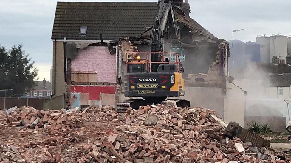 Houses being demolished