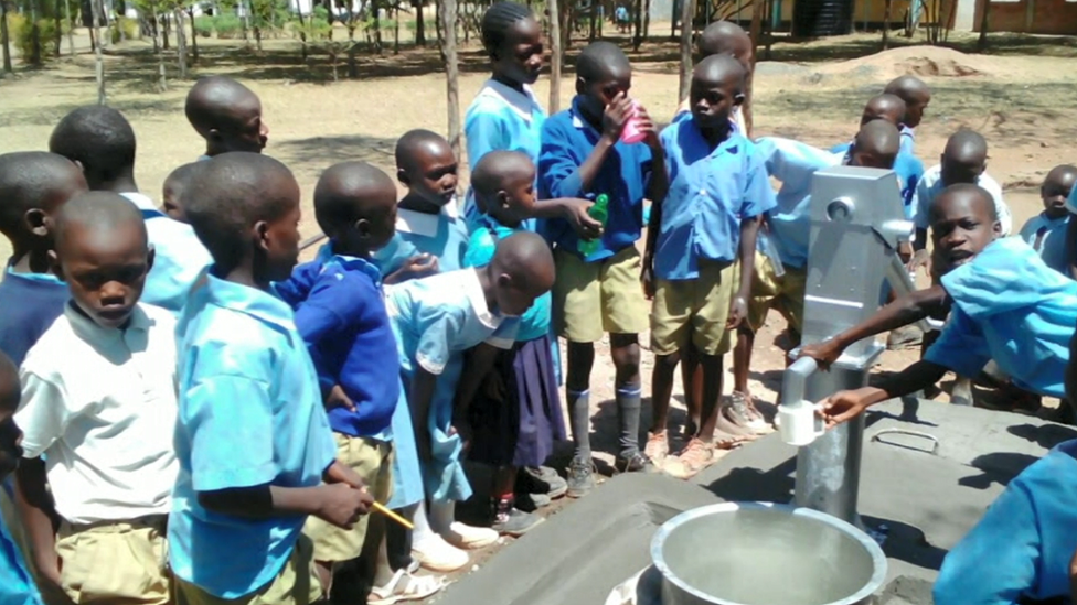 School with a water well