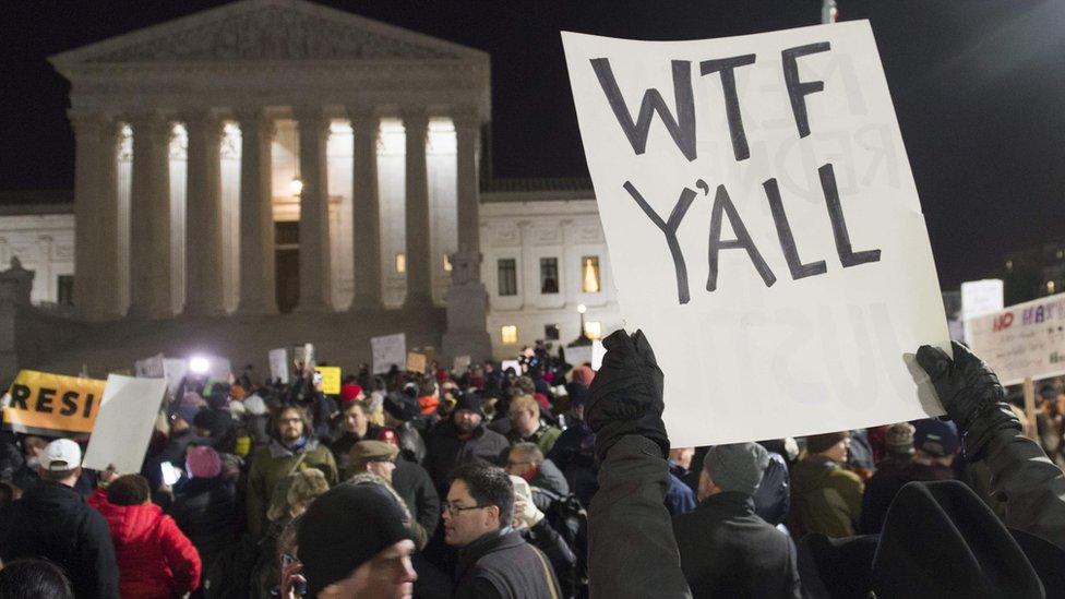 Demonstrators protest against President Trump outside the US Supreme Court