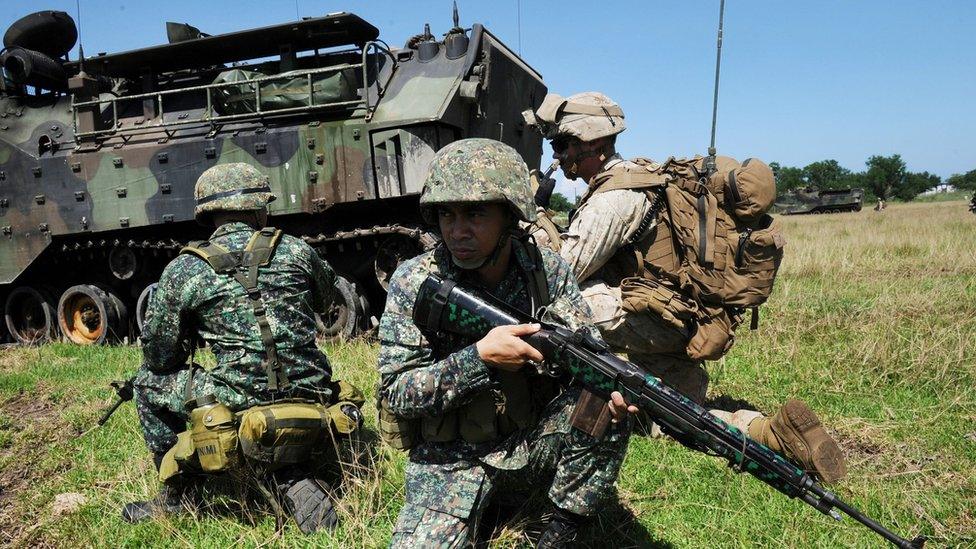 Philippine marines and their US counterparts taking part in annual Philippines-US amphibious landing exercise at navy base facing the South China Sea in San Antonio, Zambales province, north of Manila. 9 October 2015