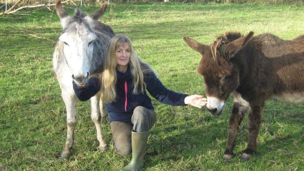 Elizabeth with donkeys