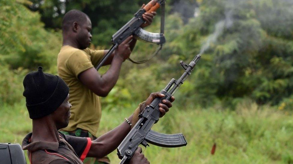 Mutinous soldiers fire in the air inside a military camp in Ivory Coast"s central second city Bouake, on May 15, 2017.