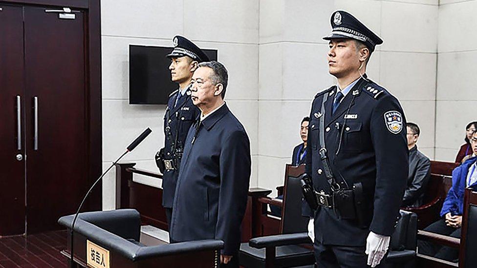 This handout photo taken on January 21, 2020 and released by the Tianjin First Intermediate People"s Court shows former Interpol chief Meng Hongwei in court