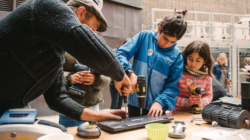 Children involved in a making activity