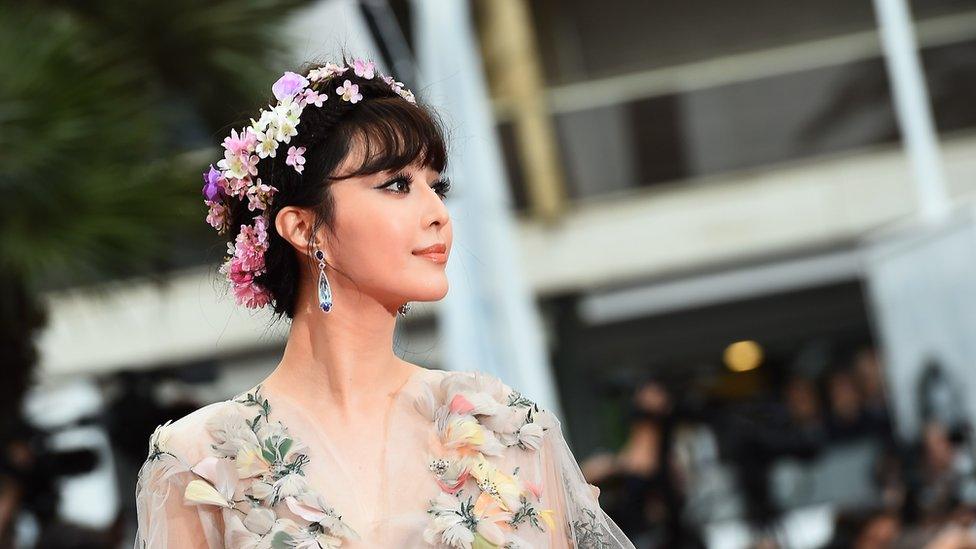 Chinese actress Fan Bingbing poses as she arrives for the screening of the film Mad Max : Fury Road