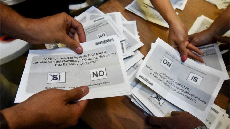 Electoral officials count votes at a polling station after a referendum on whether to ratify a historic peace accord to end Colombia's 52-year war between the state and the communist FARC rebels, in Cali, Colombia, on October 2, 2016