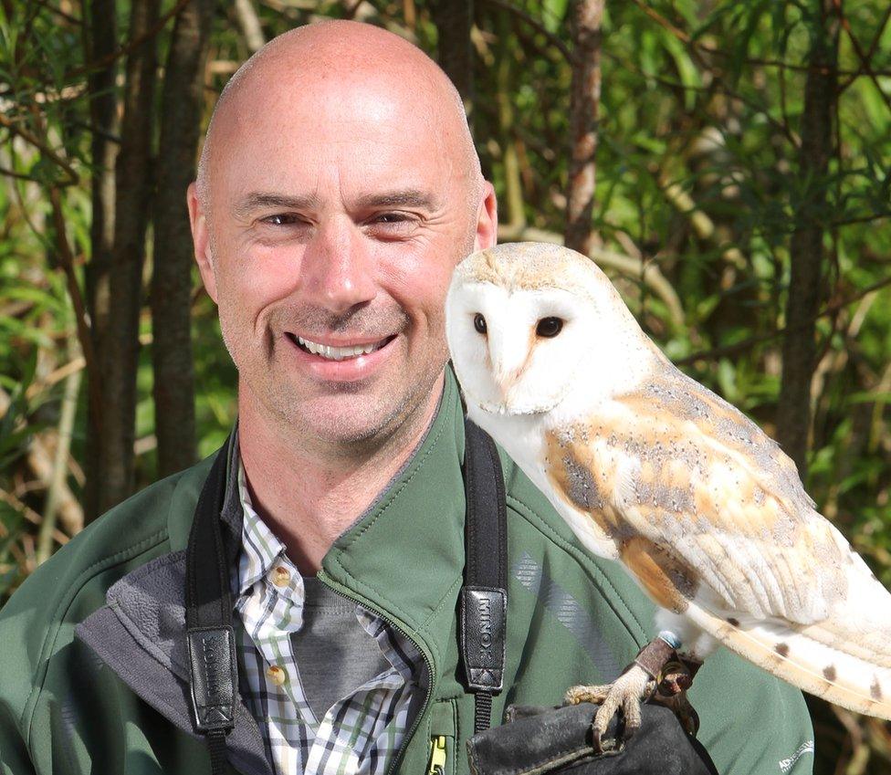 Darryl Grimason holding an owl