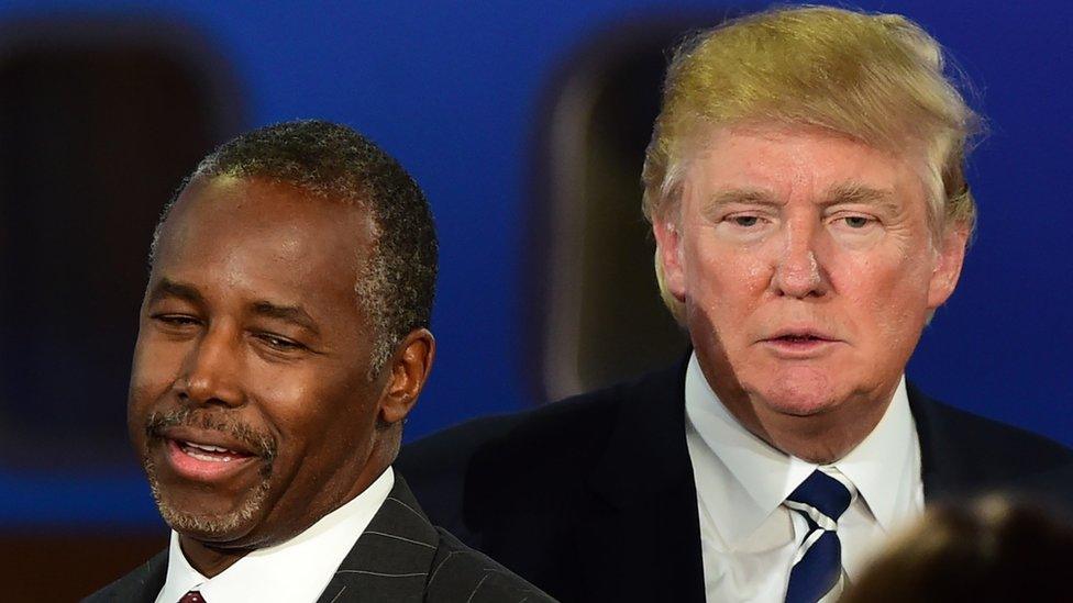 In this September 16, 2015 file photo, Republican presidential hopefuls Ben Carson and Donald Trump participate in the Republican Presidential Debate at the Ronald Reagan Presidential Library in Simi Valley, California.