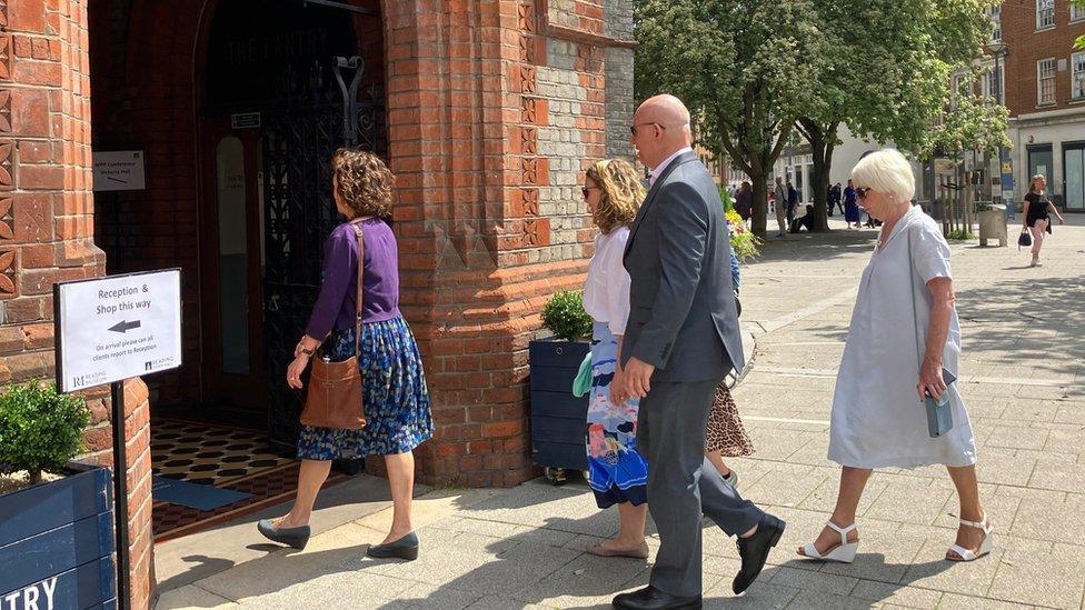 Guests arriving at the private memorial service