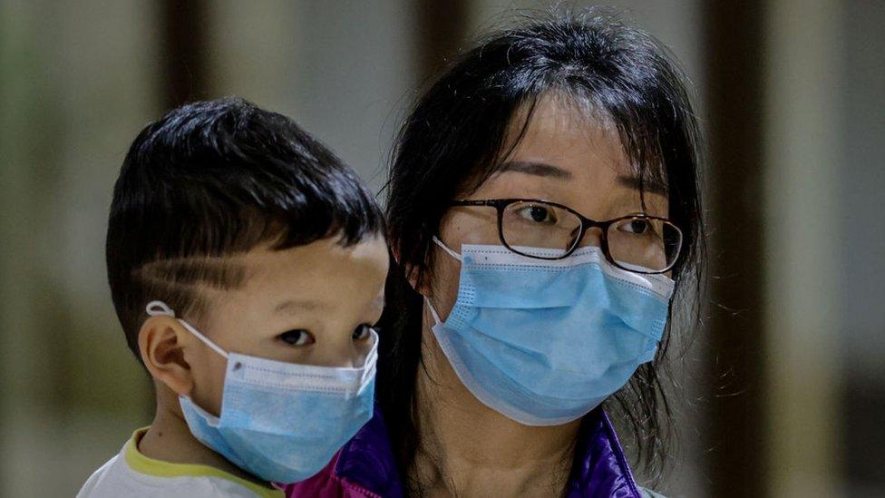 A Chinese woman and her child at the Ninoy Aquino International Airport