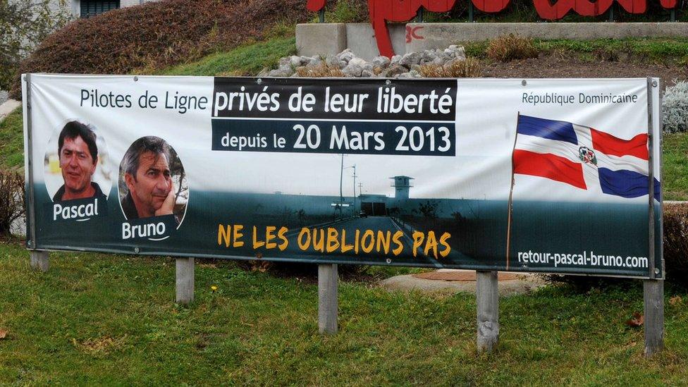 A banner showing support for Pascal Fauret and Bruno Odos is displayed in the French town of Autrans