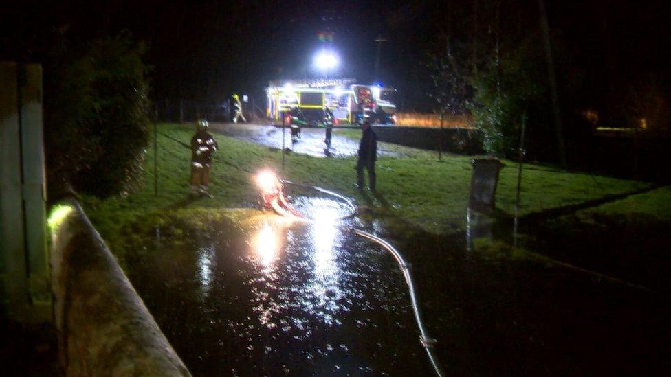 Firefighters pumping out water on Canal Road in Inverurie