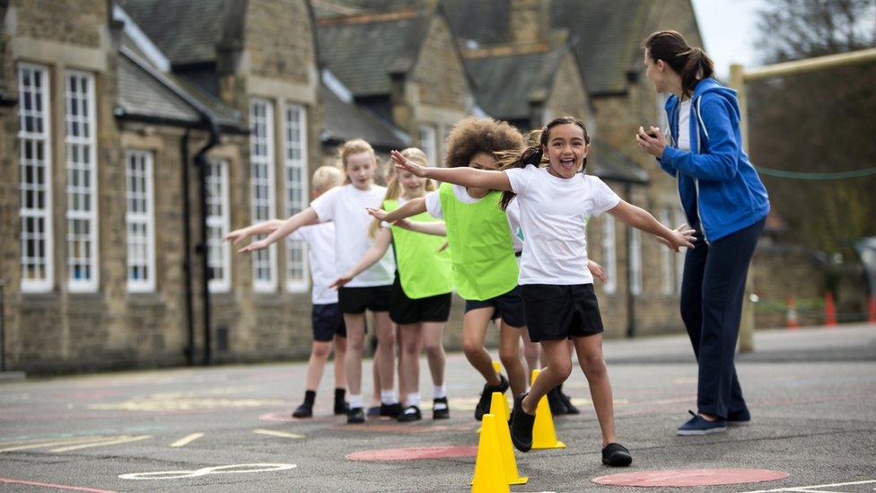 kids-doing-pe-at-school.