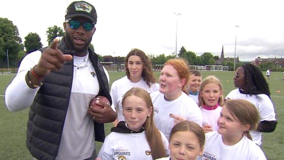 NFL star Josh Allen with kids in north Belfast