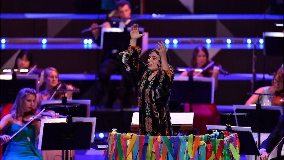 Conductor Dalia Stasevska leading a reduced orchestra of 65 at the Royal Albert Hall