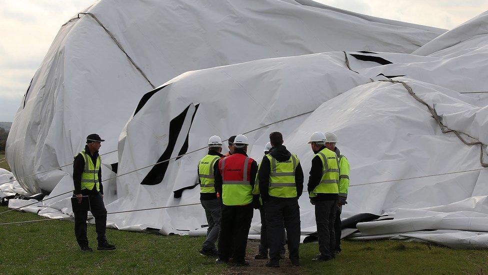 Inspectors standing by Airlander.