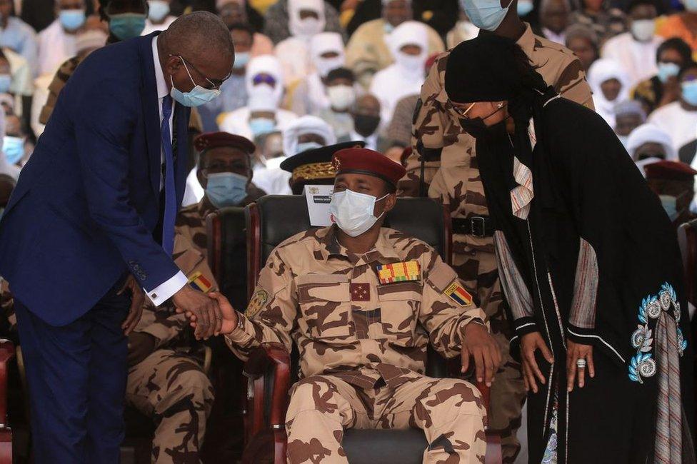 The son of the late Chadian president Idriss Deby, general Mahamat Idriss Deby (C) sits in the front row as he attends the state funeral for the late Chadian president Idriss Deby in N'Djamena on April 23, 2021.