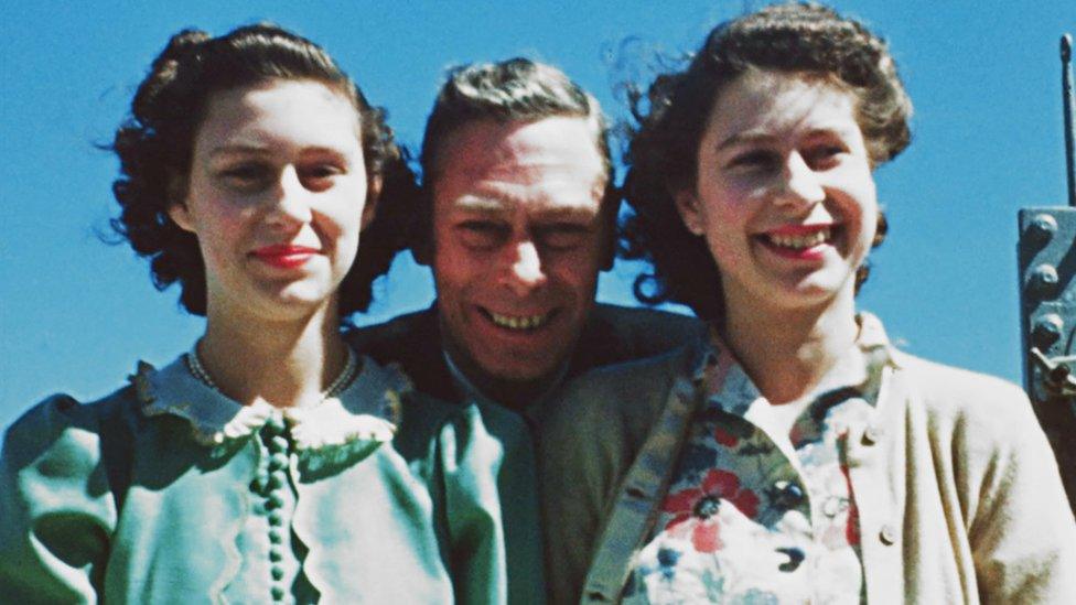 The Queen, pictured with her father George VI and her sister Princess Margaret (left)