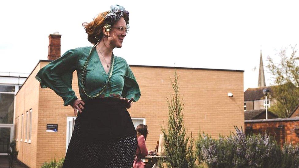 woman in green dress