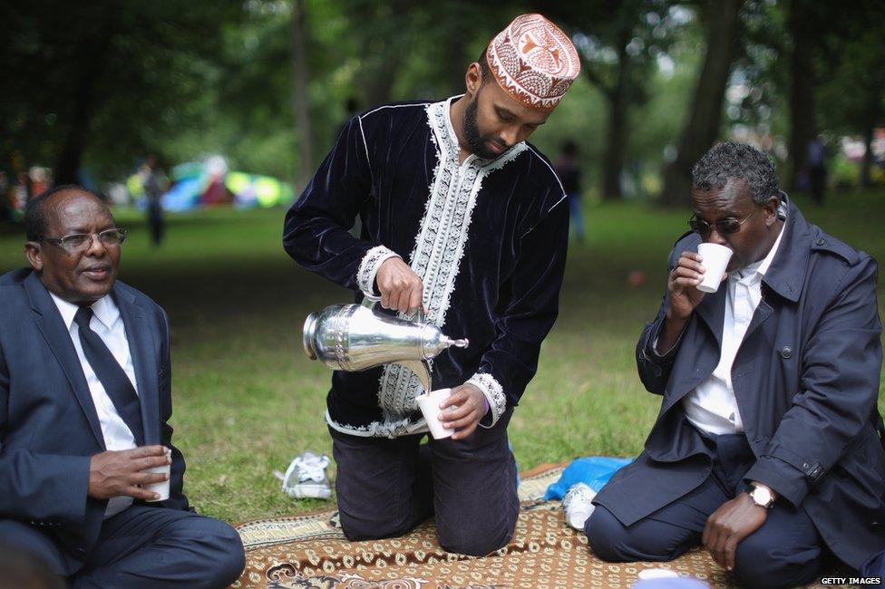 Members of the Somali community share tea as they picnic and celebrate the festival of Eid in Small Heath Park