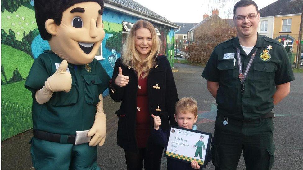 Jess Austin with her son Beau and Ashley Page, the operator who took the call