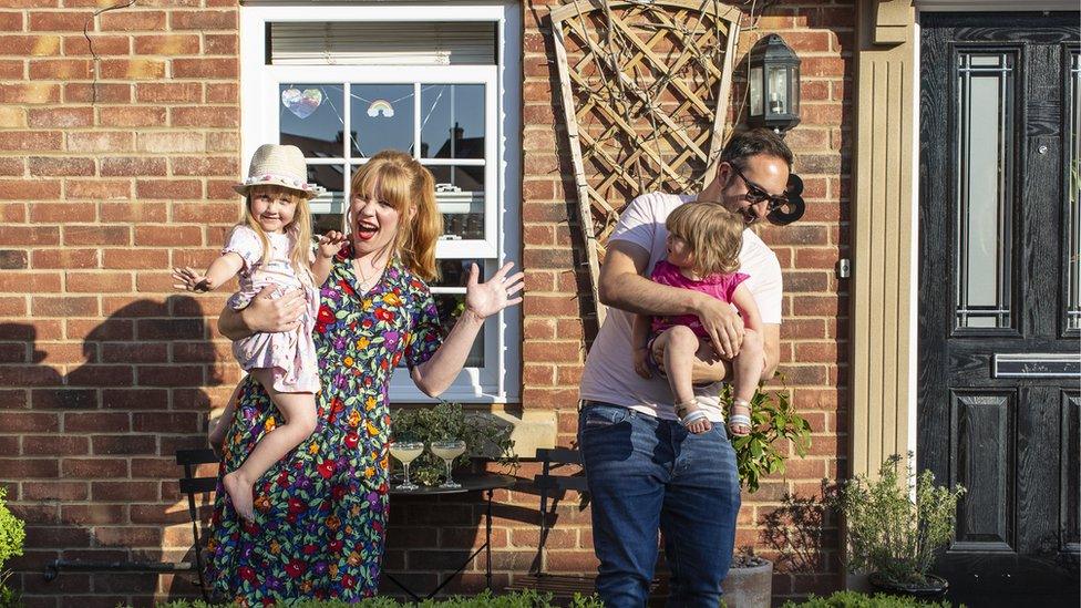 A family outside their home in Bedford