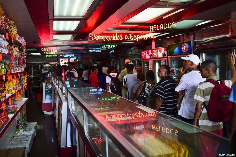 Long lines for a bakery in Caracas, Venezuela