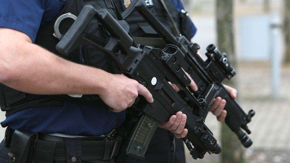 Armed UK police officers with Heckler & Koch G36C assault rifles