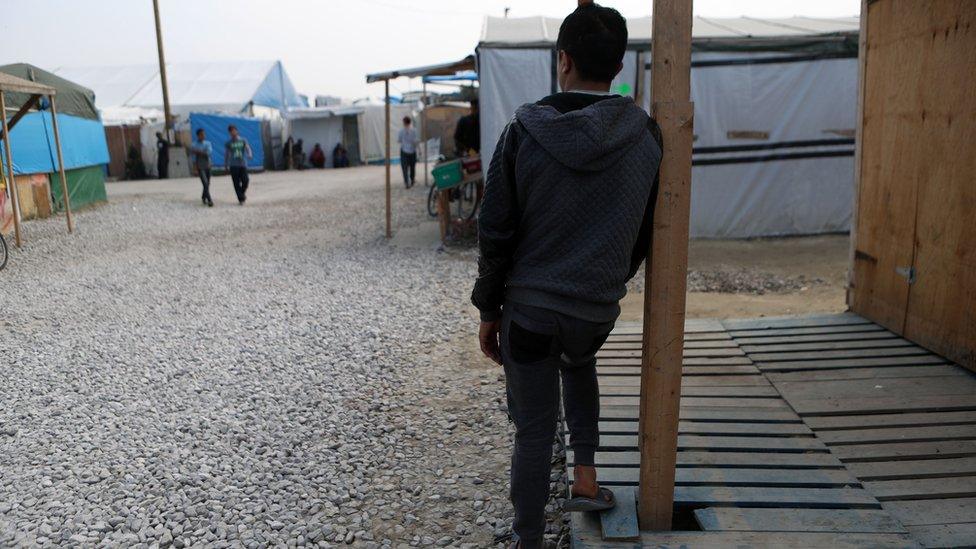 Child at the Calais migrant camp