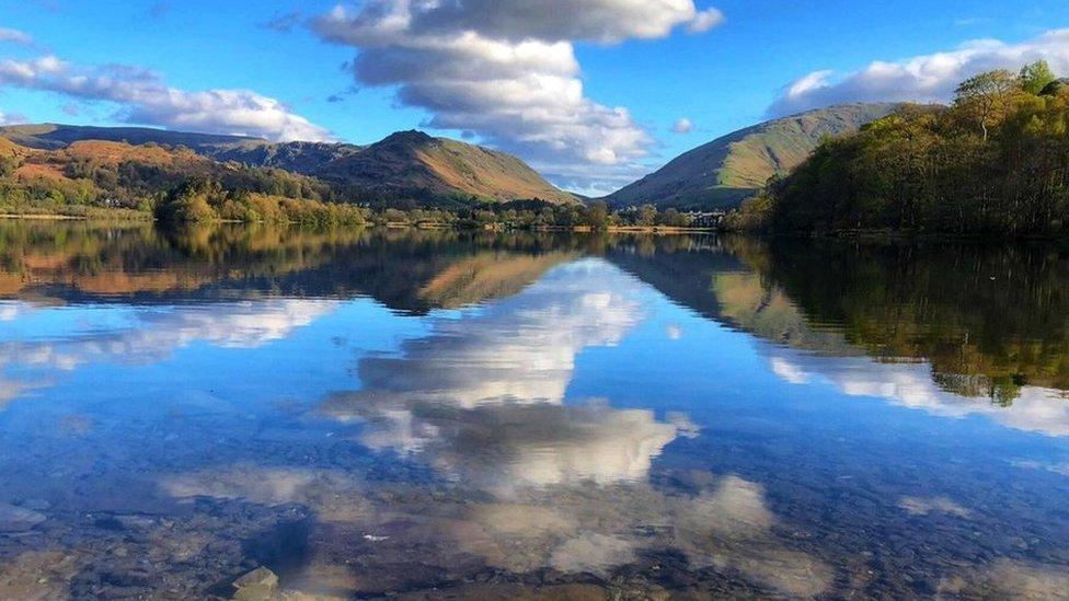 May - Fluffy clouds falling into Grasmere