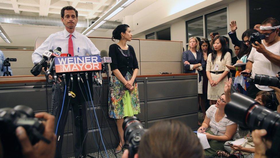 Weiner appears before the press with Abedin to admit another sexting scandal