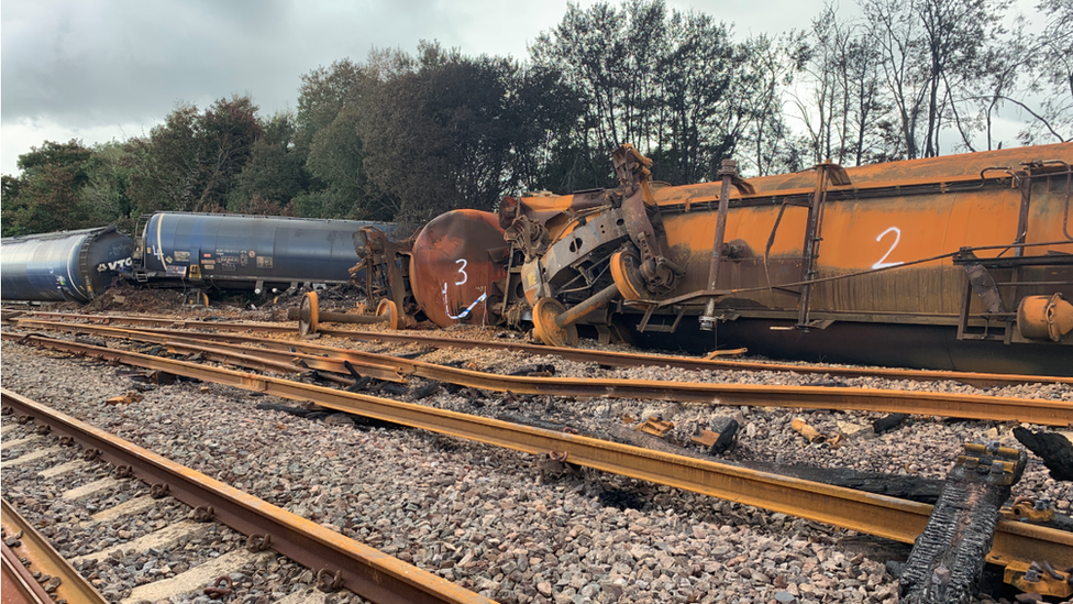 The burnt out wreckage of the train crash