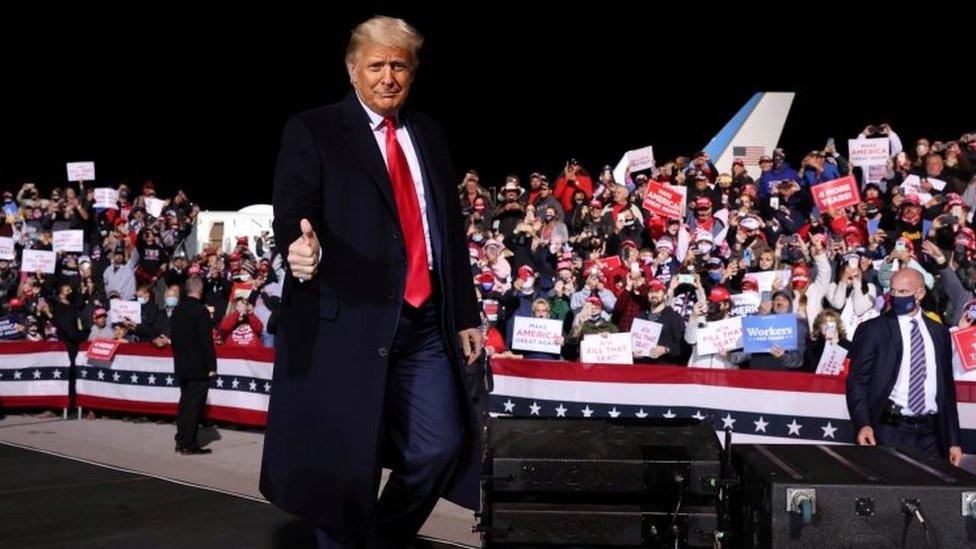 President Donald Trump holds a campaign rally at an airport in Johnstown