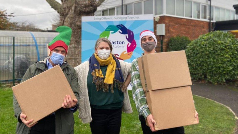 People carrying boxes