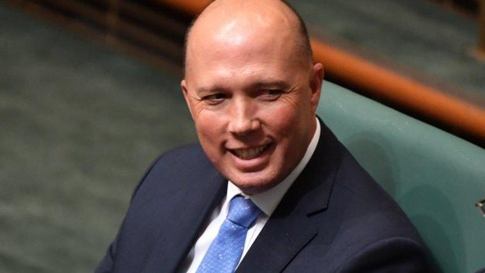 Home Affairs Minister Peter Dutton sits in parliament