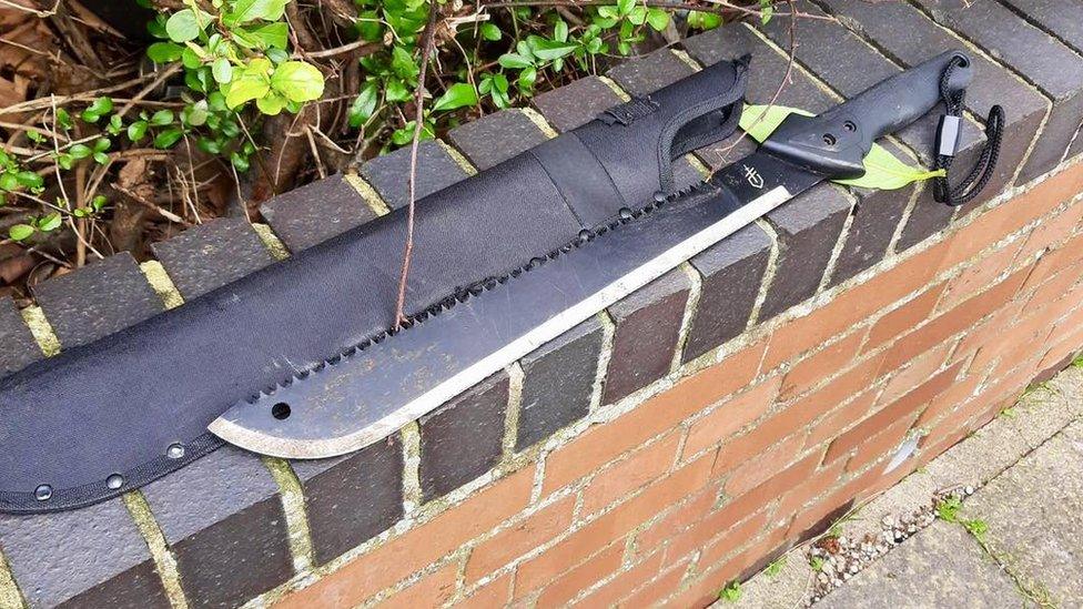 A large black knife found by officers