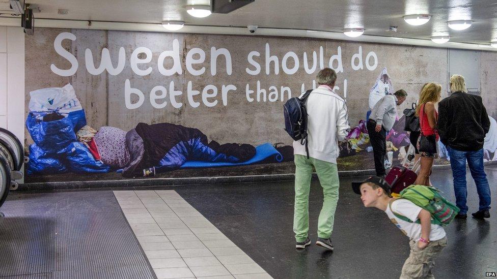 A poster showing homeless people with the text "Sweden should do better than this"