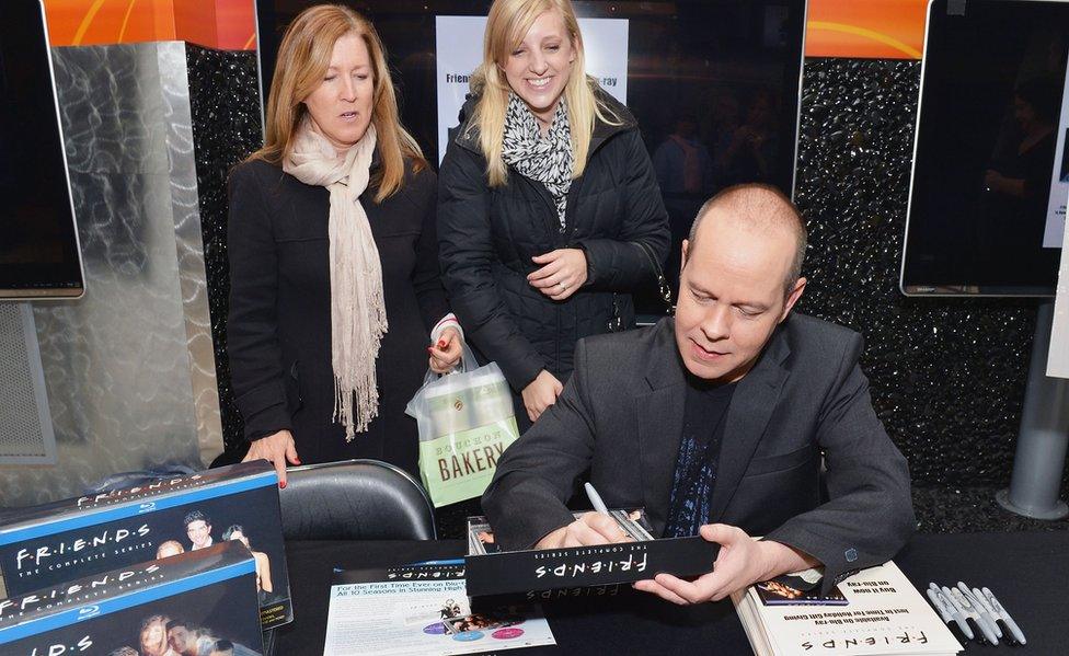 James Michael Tyler signing Friends merchandise