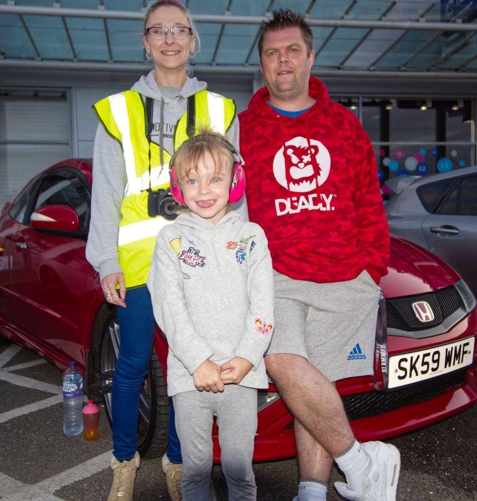 Kirsty Elliott, her husband Luke and daughter Phoebe