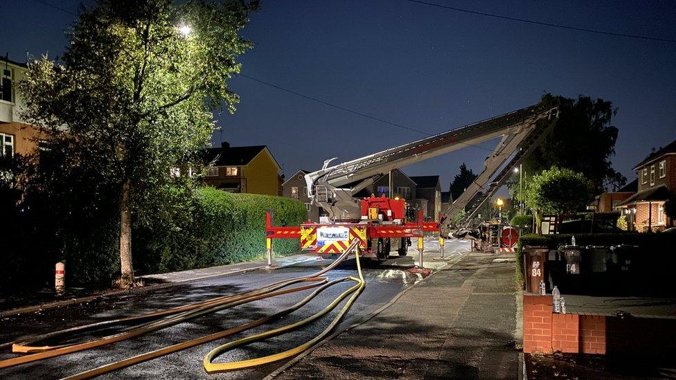 A fire engine dealing with a fire at Balmoral Drive, Borehamwood