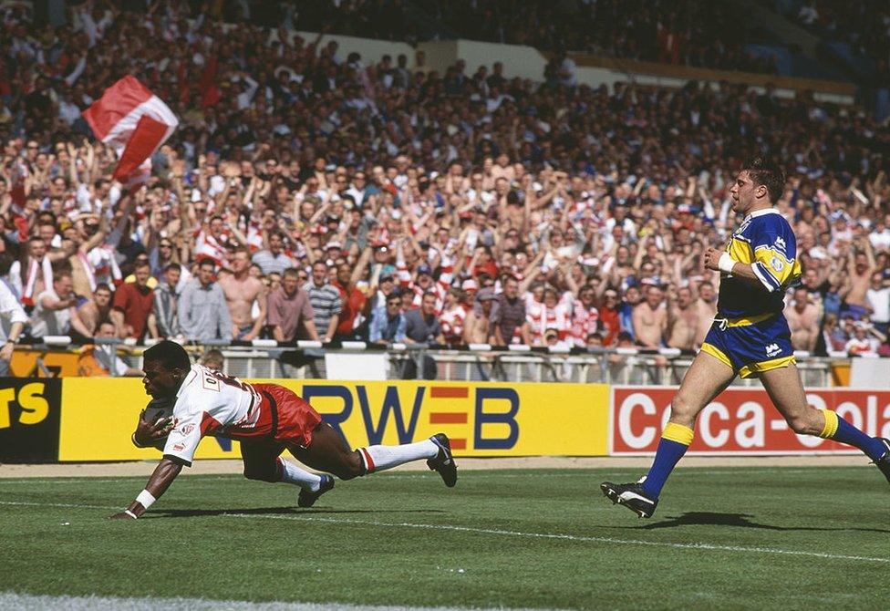 Martin Offiah of Wigan scores one of his two tries against Leeds in the Silk Cut Challenge Cup final at Wembley Stadium, London, 30th April 1994