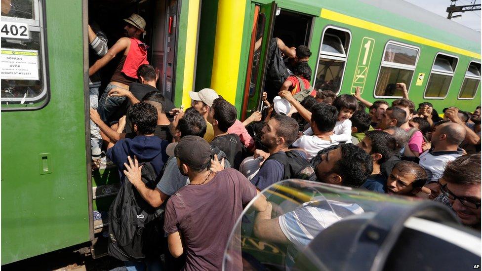 Migrant and police at Bicske, Hungary, 3 September 2015