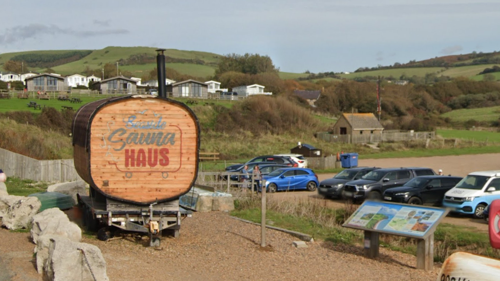 Sauna on stones next to car park