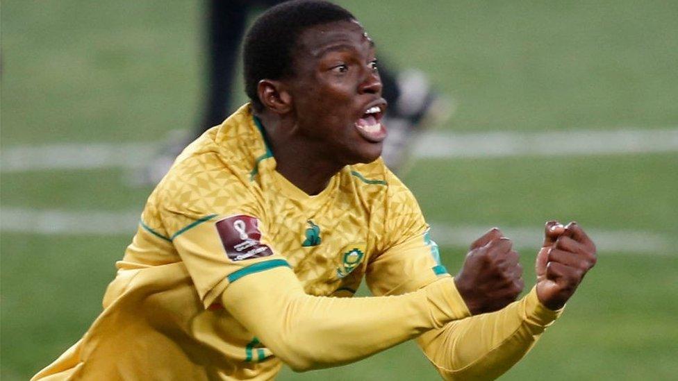 Bongokuhle Hlongwane celebrates after scoring his team's first goal during the FIFA World Cup Qatar 2022 qualifying round Group G football match between South Africa and Ghana at the FNB Stadium in Johannesburg on September 6, 2021.