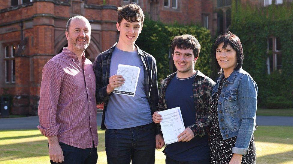 Twins Aaron and Angus Pollock with parents Cathy and Bill