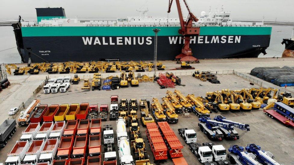 A shipment of vehicles prepares to leave for the UK