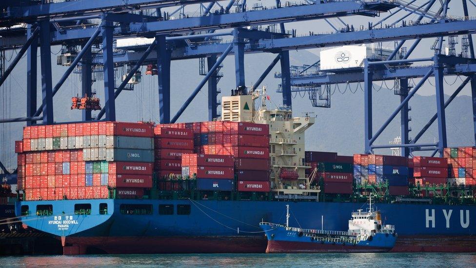 A cargo ship being loaded at a Chinese port