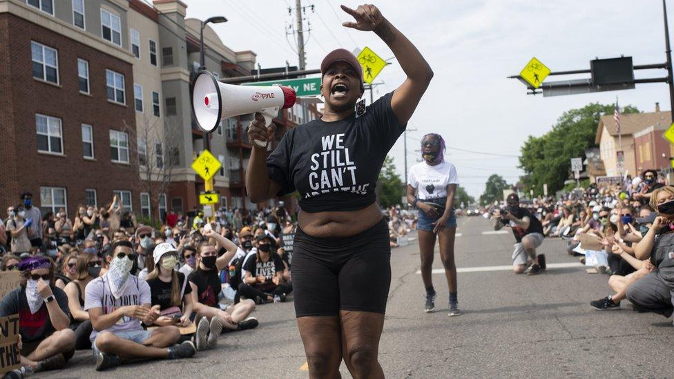 Demonstrators marching to defund the Minneapolis Police Department dance on University Avenue on June 6, 2020 in Minneapolis