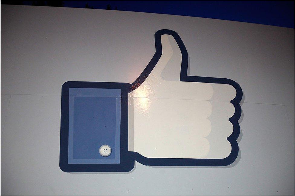 A 'like' sign stands at the entrance of Facebook headquarters 18 May 2012 in Menlo Park, California